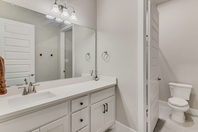 175 Stirling Dr, Argyle, TX 76226 - bathroom featuring toilet, baseboards, and vanity