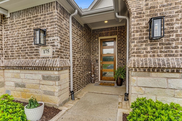 175 Stirling Dr, Argyle, TX 76226 - doorway to property featuring brick siding