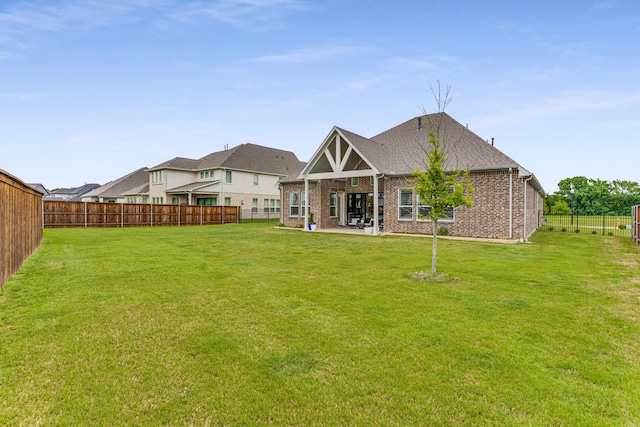 175 Stirling Dr, Argyle, TX 76226 - rear view of house featuring a patio, brick siding, and roof with shingles