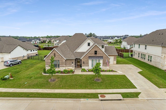 175 Stirling Dr, Argyle, TX 76226 - view of front of property featuring brick siding, a residential view, a shingled roof, and concrete driveway