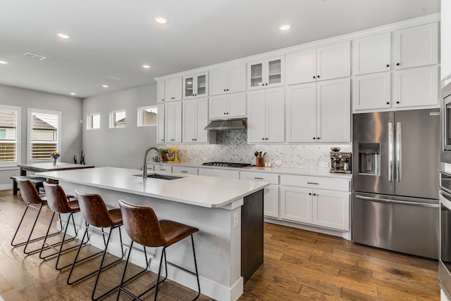 175 Stirling Dr, Argyle, TX 76226 - kitchen featuring a sink, stainless steel refrigerator with ice dispenser, gas stovetop, tasteful backsplash, and light countertops