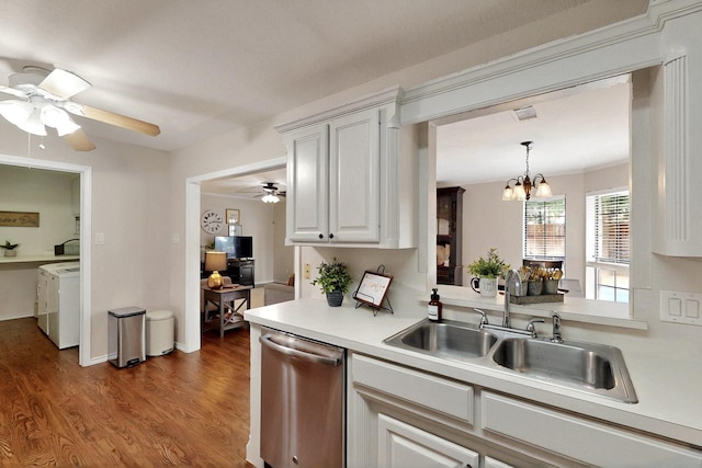 kitchen with dishwasher, a sink, separate washer and dryer, ceiling fan, and light countertops