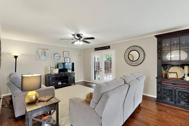 living room featuring a ceiling fan, baseboards, dark wood-style flooring, french doors, and crown molding