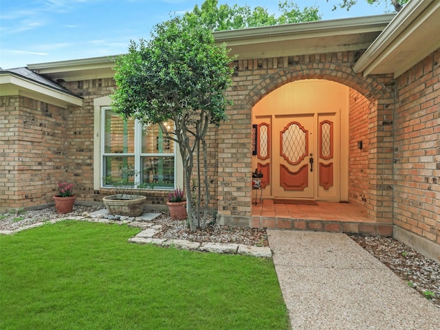 2626 Rivercrest Dr, Arlington, TX 76006 - entrance to property featuring brick siding and a lawn