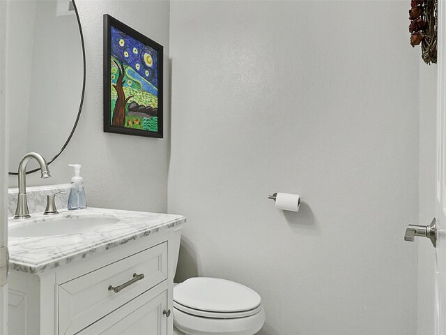 2626 Rivercrest Dr, Arlington, TX 76006 - half bathroom with vanity and toilet