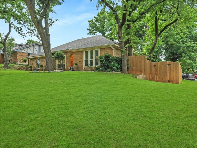 2626 Rivercrest Dr, Arlington, TX 76006 - view of front facade with brick siding and roof with shingles