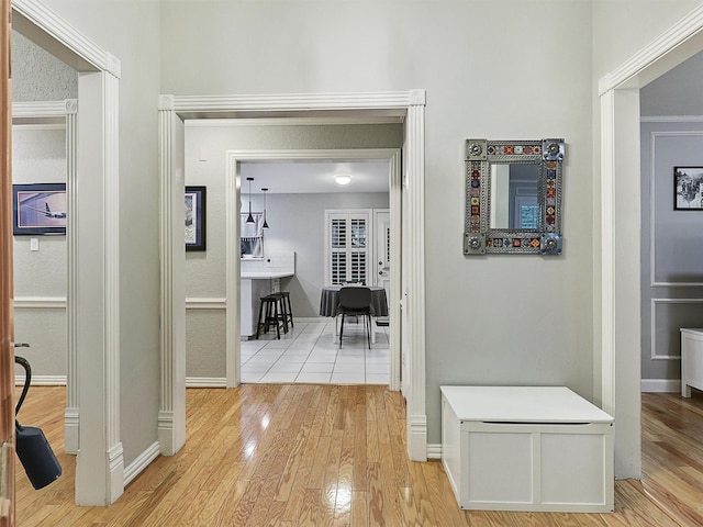 2626 Rivercrest Dr, Arlington, TX 76006 - hallway with light wood-style floors and baseboards