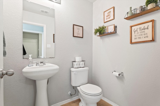 240 Willow Creek Ln, Terrell, TX 75160 - bathroom with toilet and a sink