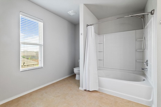 240 Willow Creek Ln, Terrell, TX 75160 - bathroom featuring toilet, tile patterned floors, shower / bath combination with curtain, and baseboards