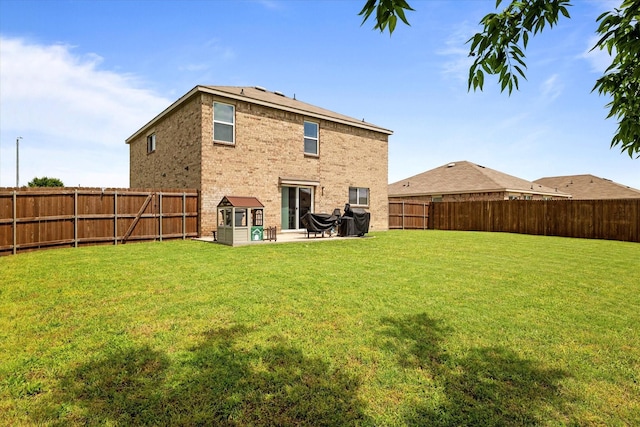 240 Willow Creek Ln, Terrell, TX 75160 - back of house with a patio area and brick siding