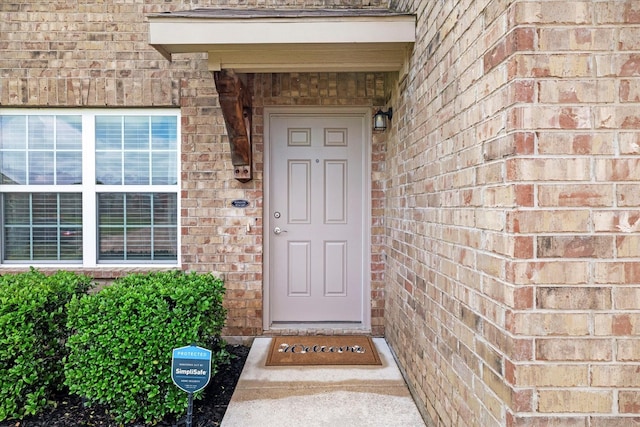 240 Willow Creek Ln, Terrell, TX 75160 - view of exterior entry featuring brick siding