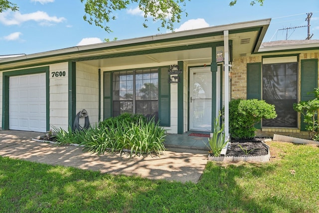 7600 Independence Dr, The Colony, TX 75056 - doorway to property featuring a porch