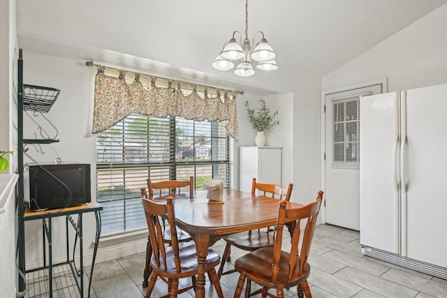 7600 Independence Dr, The Colony, TX 75056 - dining space featuring a chandelier and lofted ceiling