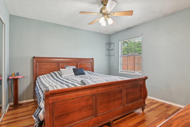 7600 Independence Dr, The Colony, TX 75056 - bedroom with light wood-type flooring, baseboards, and a ceiling fan