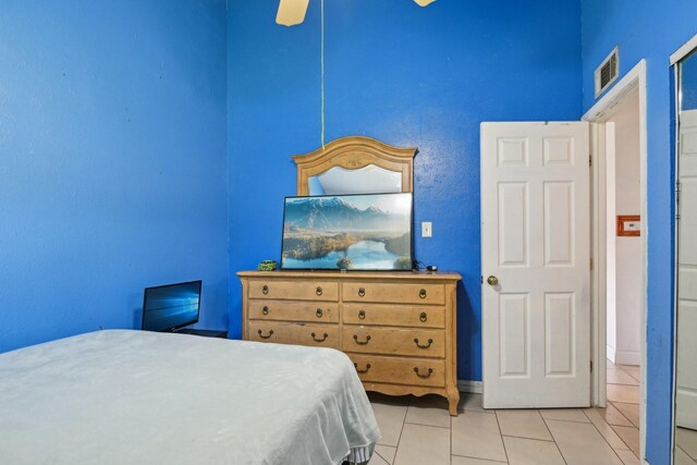 7600 Independence Dr, The Colony, TX 75056 - bedroom with tile patterned flooring and baseboards
