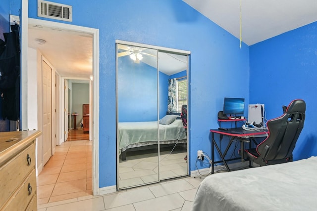 7600 Independence Dr, The Colony, TX 75056 - tiled bedroom with lofted ceiling, a closet, and an office area