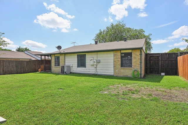 7600 Independence Dr, The Colony, TX 75056 - back of property with central AC and brick siding