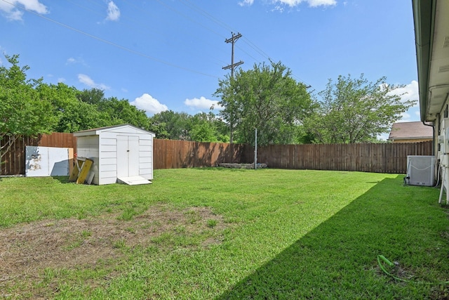 7600 Independence Dr, The Colony, TX 75056 - view of yard with a shed, central AC, and an outbuilding