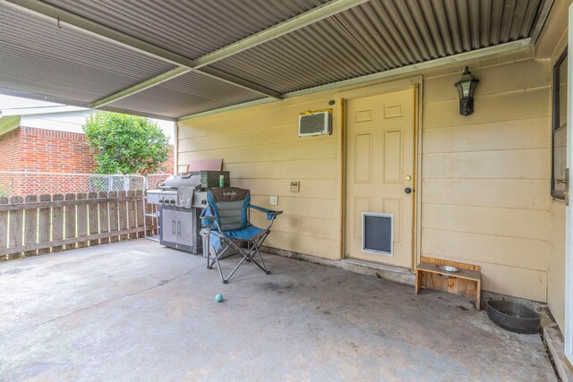 view of patio / terrace featuring fence