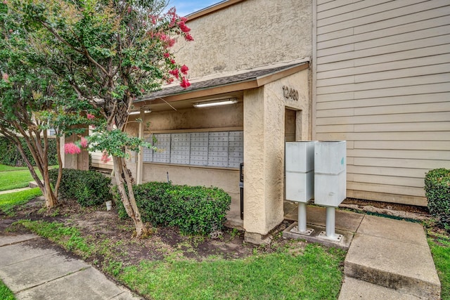 12480 Abrams Rd Unit 2801, Dallas, TX 75243 - exterior view of mail area and stucco siding