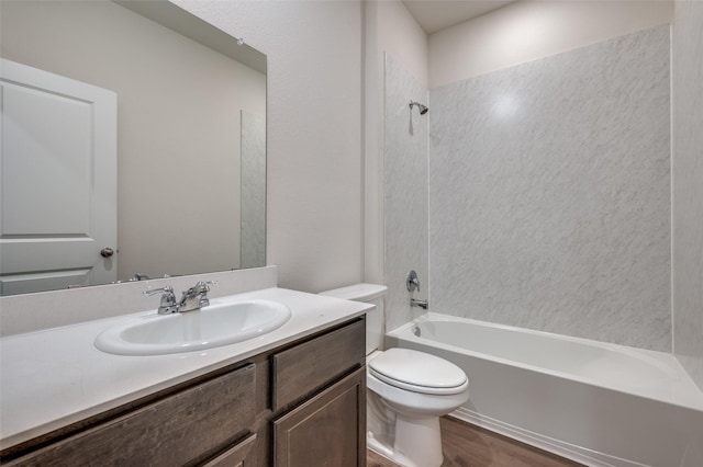 13156 Sanctuary Dr, Providence Village, TX 76227 - full bathroom with wood finished floors, toilet, bathtub / shower combination, and vanity