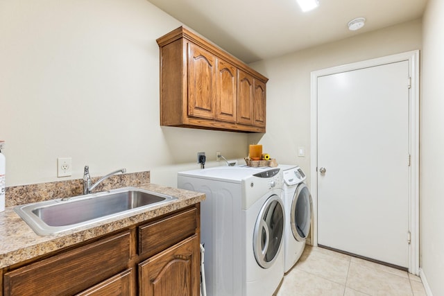 3455 Crosshaven Ln, Frisco, TX 75033 - laundry area with independent washer and dryer, cabinet space, and light tile patterned floors