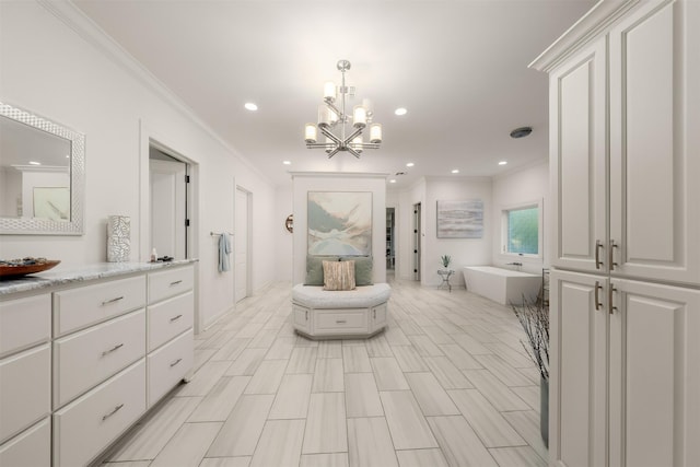 1020 Canyon Trl, Waco, TX 76657 - bathroom with a chandelier, ornamental molding, a soaking tub, vanity, and recessed lighting