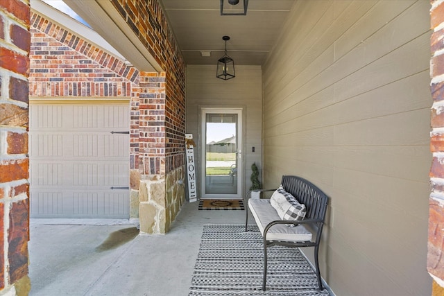 223 Exploration Way, Fate, TX 75189 - doorway to property featuring a garage