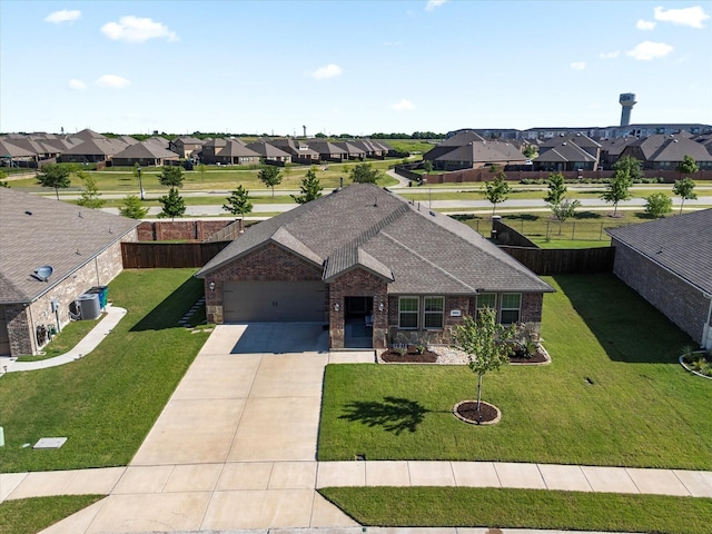223 Exploration Way, Fate, TX 75189 - view of front of house featuring a residential view, brick siding, driveway, a garage, and cooling unit