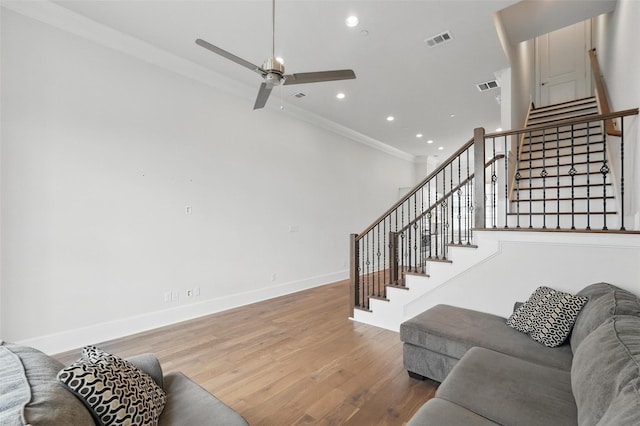 living room featuring a ceiling fan, stairway, wood finished floors, recessed lighting, and baseboards