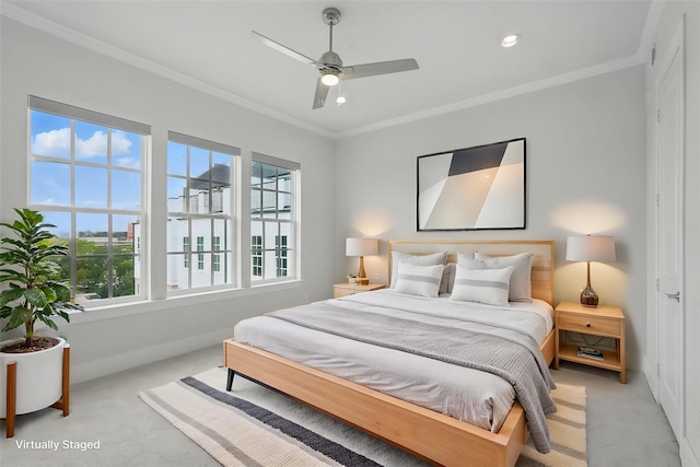 carpeted bedroom featuring baseboards, crown molding, recessed lighting, and ceiling fan