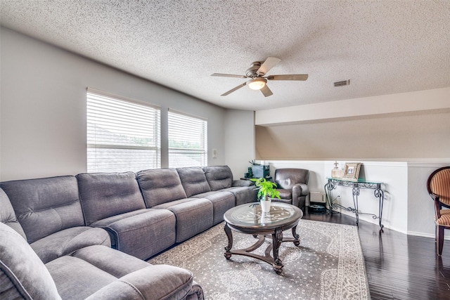 1407 Hickory Bend Dr, Allen, TX 75002 - living area with a ceiling fan, wood finished floors, a textured ceiling, and baseboards