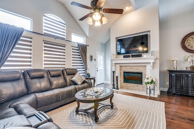 1407 Hickory Bend Dr, Allen, TX 75002 - living area featuring a ceiling fan, a stone fireplace, wood finished floors, and high vaulted ceiling