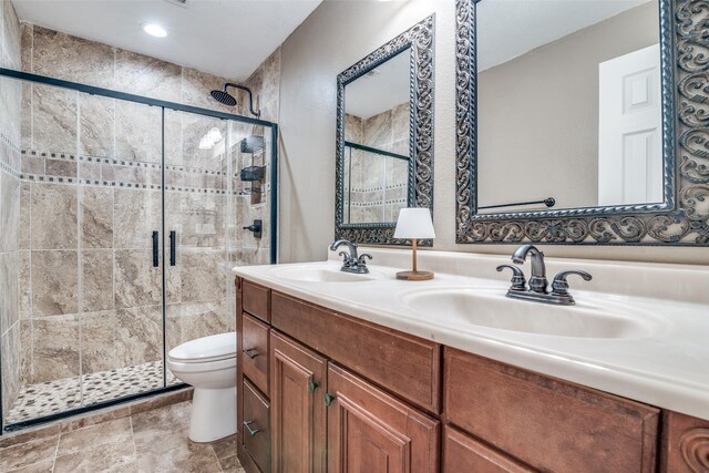 1407 Hickory Bend Dr, Allen, TX 75002 - full bathroom with toilet, a shower stall, and double vanity