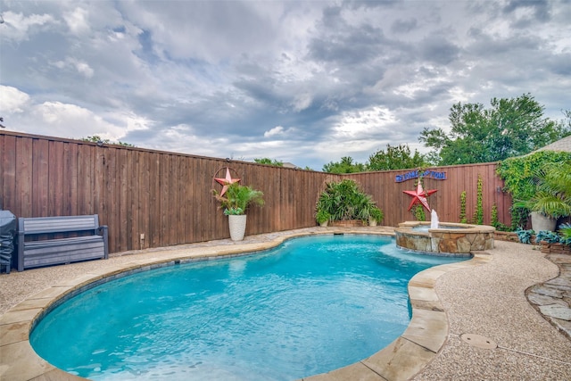 1407 Hickory Bend Dr, Allen, TX 75002 - view of pool with a fenced backyard and a pool with connected hot tub