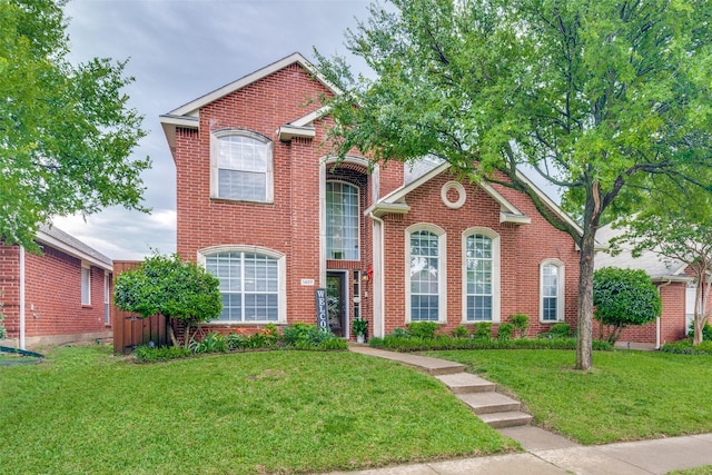 1407 Hickory Bend Dr, Allen, TX 75002 - traditional home featuring brick siding and a front yard