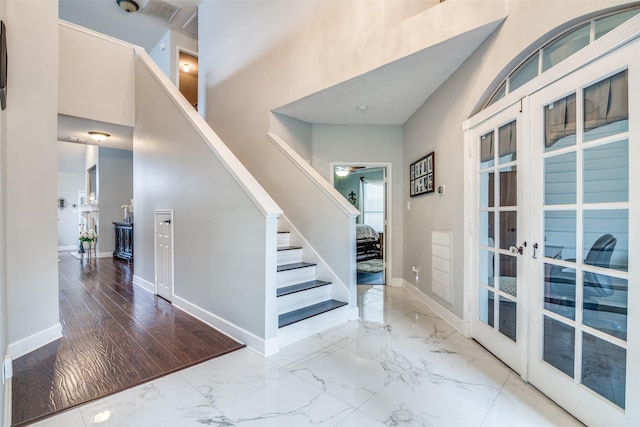 1407 Hickory Bend Dr, Allen, TX 75002 - stairs with a high ceiling, marble finish floors, baseboards, and french doors