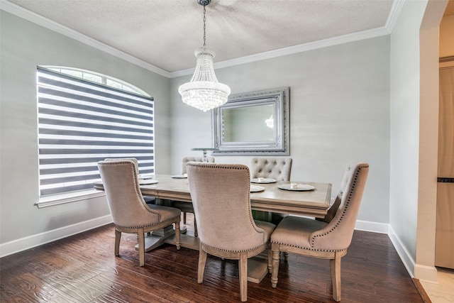 1407 Hickory Bend Dr, Allen, TX 75002 - dining area featuring crown molding, a chandelier, baseboards, wood finished floors, and a textured ceiling