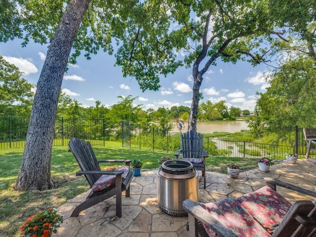 view of patio / terrace featuring a water view