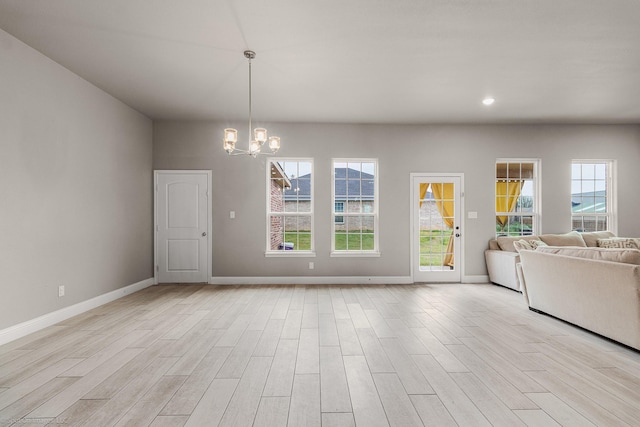 5585 Justine Pl, Fort Worth, TX 76126 - unfurnished dining area with a chandelier, light wood-style floors, baseboards, and recessed lighting