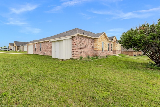 5585 Justine Pl, Fort Worth, TX 76126 - view of side of home featuring a garage, a yard, and brick siding