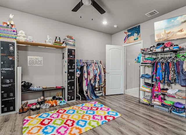 5585 Justine Pl, Fort Worth, TX 76126 - playroom with a ceiling fan, wood finished floors, and baseboards