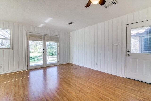 214 S Clark St, Rockwall, TX 75087 - empty room featuring light wood finished floors, ceiling fan, and baseboards