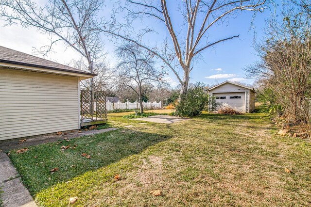214 S Clark St, Rockwall, TX 75087 - view of yard with a garage and an outbuilding