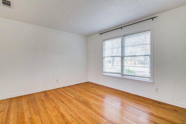 214 S Clark St, Rockwall, TX 75087 - unfurnished room with light wood finished floors and baseboards