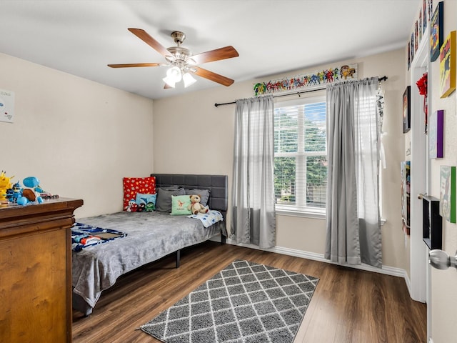 5221 Wheat Sheaf Trl, Fort Worth, TX 76179 - bedroom with wood finished floors, a ceiling fan, and baseboards