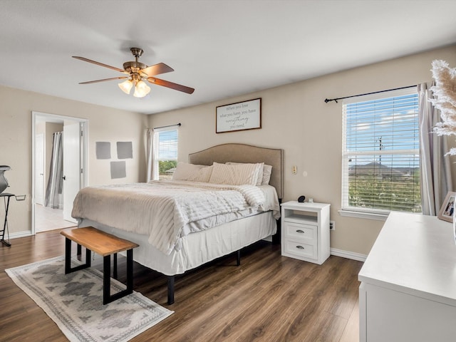 5221 Wheat Sheaf Trl, Fort Worth, TX 76179 - bedroom with dark wood-style floors, baseboards, and a ceiling fan