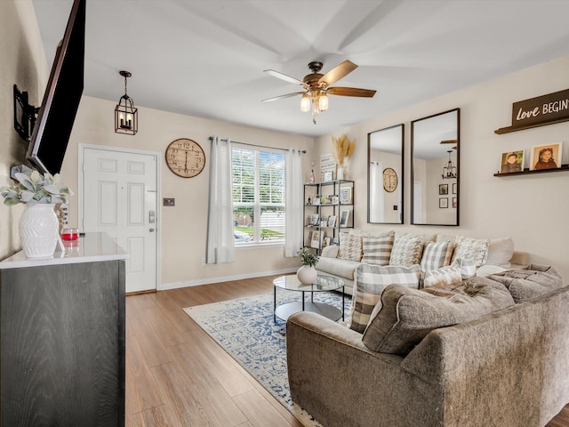 5221 Wheat Sheaf Trl, Fort Worth, TX 76179 - living area featuring ceiling fan, light wood-type flooring, and baseboards