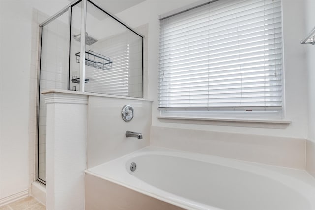 110 Commonwealth Cir, Waxahachie, TX 75165 - bathroom with a garden tub and a stall shower
