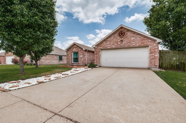 110 Commonwealth Cir, Waxahachie, TX 75165 - ranch-style house with brick siding and driveway